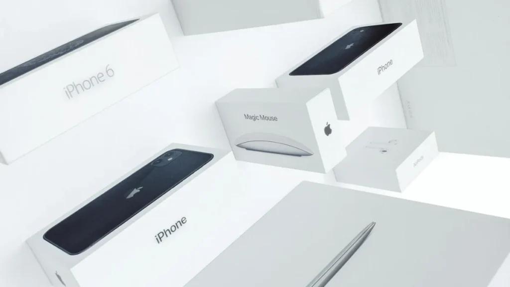 Apple's Roadmap; Apple MacBook iPhone Airpods and Mouse with their boxes