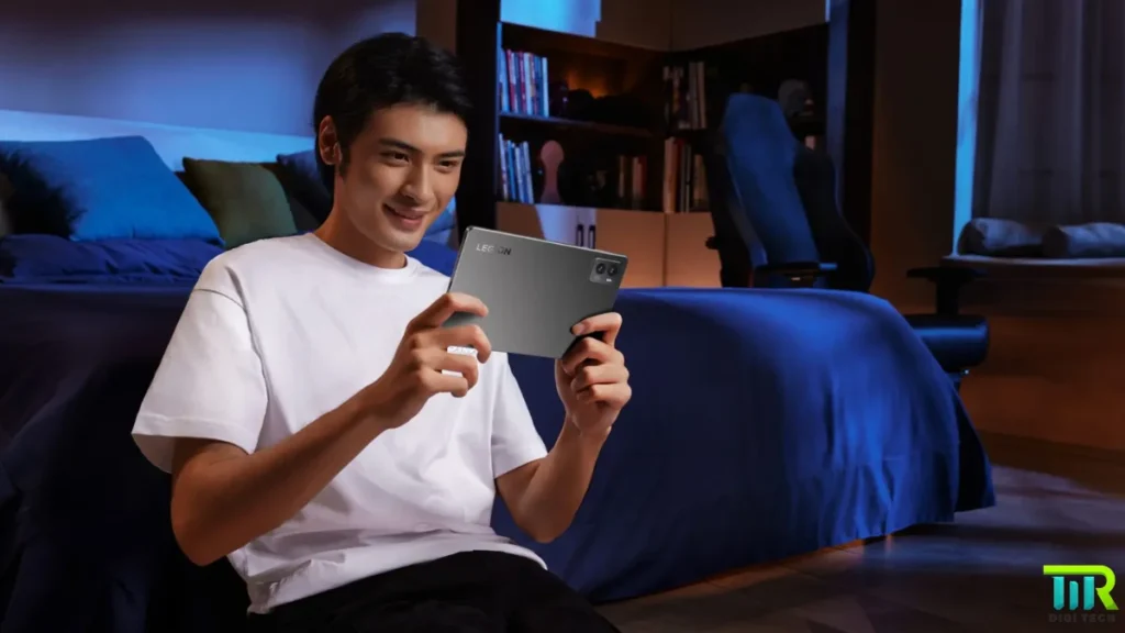 A man playing games in Lenovo Legion Tab in his room.